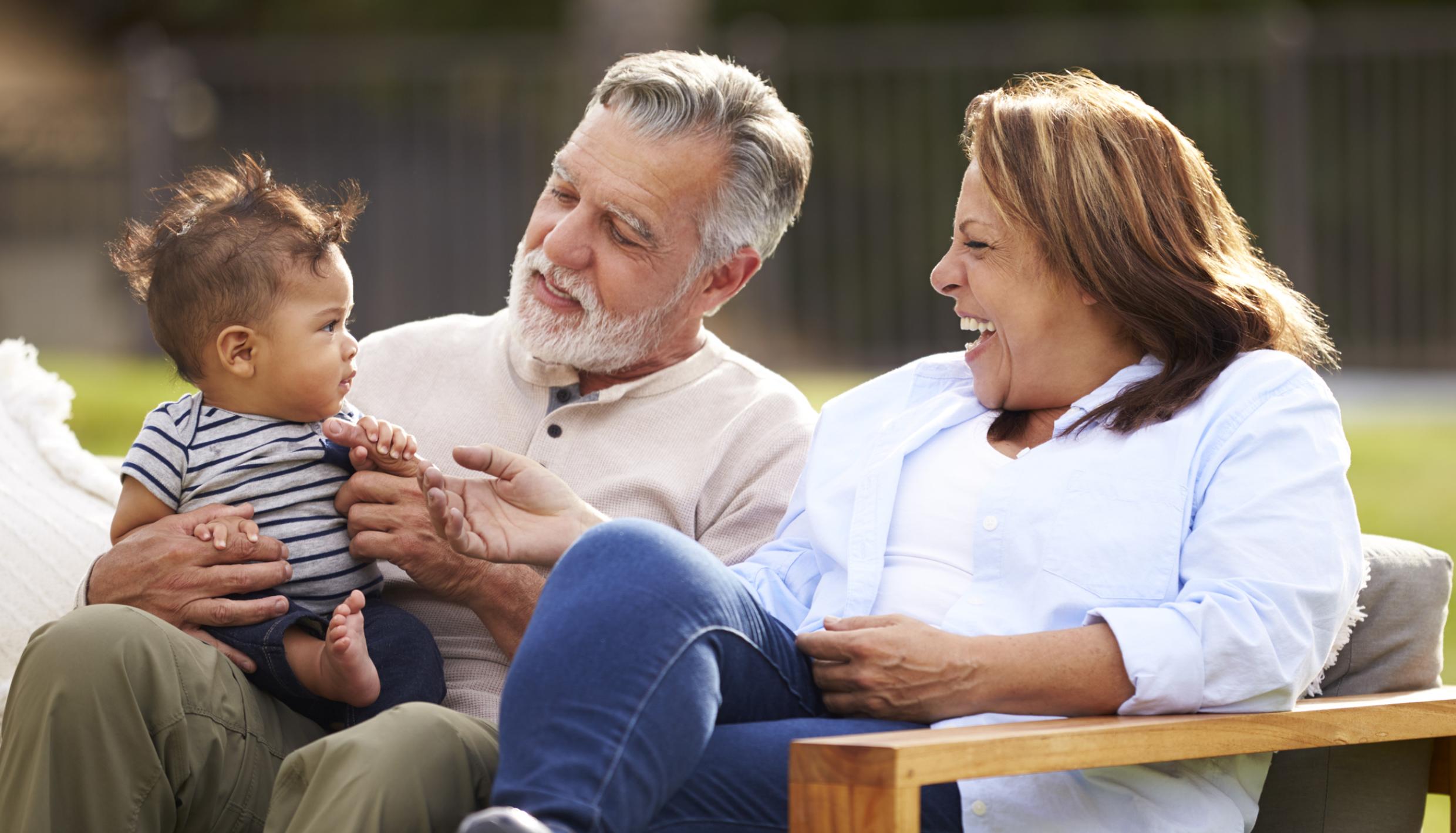 family sitting outside