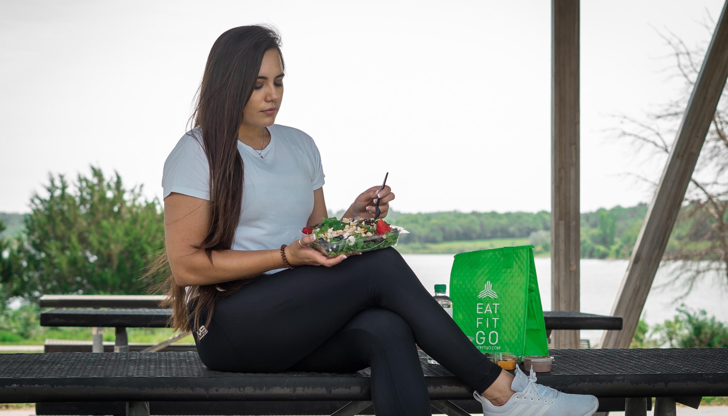 woman eating a salad
